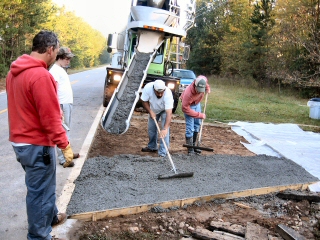 Premier Concrete team pouring the concrete drivewau